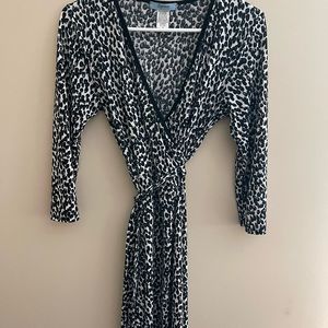 Tie at waist wrap dress ,with edgy print casual for office or nighttime outfit!!
